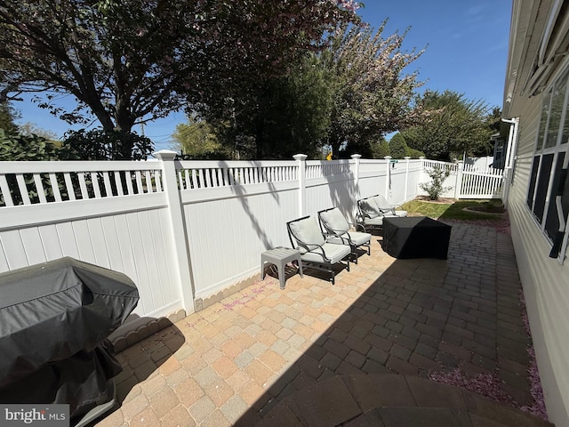 view of patio featuring a fenced backyard