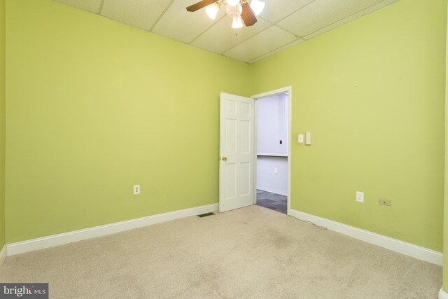 1738 Shanwick Rd, Forest Hill, MD 21050 - carpeted spare room featuring a paneled ceiling, baseboards, and ceiling fan