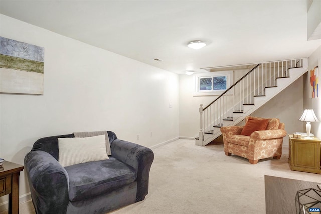 883 Locust Ave, Charlottesville, VA 22902 - carpeted living area with baseboards, visible vents, and stairway