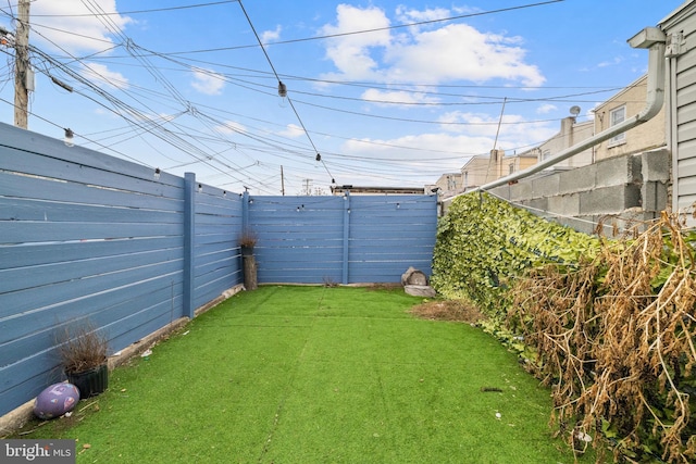 view of yard featuring fence