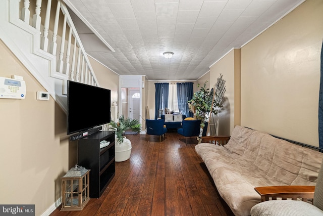 living room with wood-type flooring and stairway