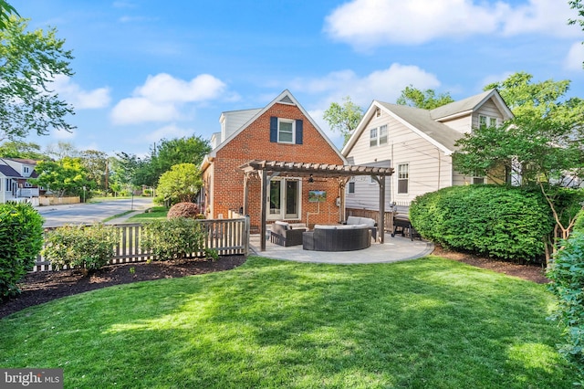 rear view of property with a pergola, an outdoor hangout area, brick siding, and a lawn