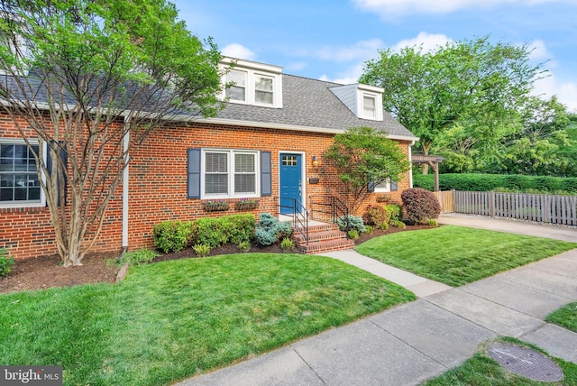 new england style home with brick siding and roof with shingles