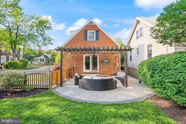 back of property with a pergola, an outdoor hangout area, brick siding, a patio area, and a chimney