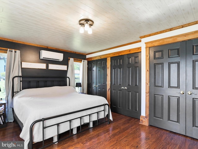 bedroom featuring crown molding, wood finished floors, wood ceiling, and a wall mounted air conditioner