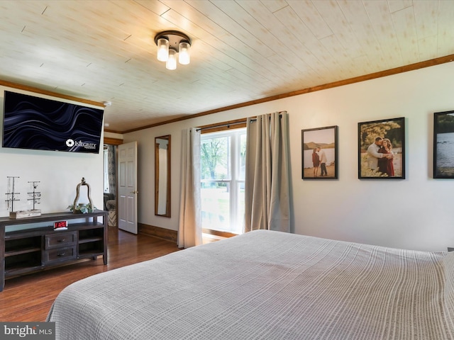 bedroom featuring crown molding, dark wood-style flooring, and wood ceiling