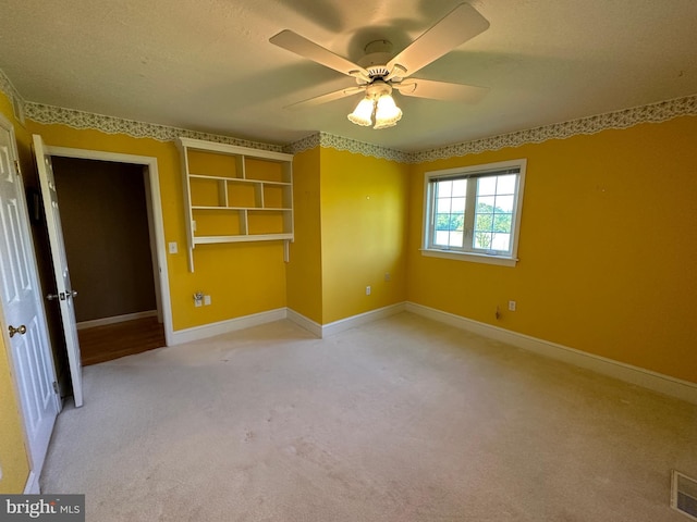 15004 Burnt Mill Rd, Shippensburg, PA 17257 - spare room featuring light colored carpet, baseboards, and a ceiling fan
