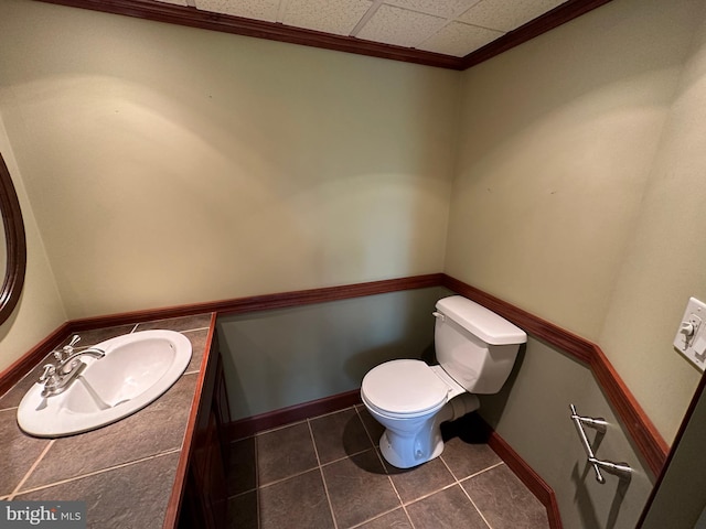 15004 Burnt Mill Rd, Shippensburg, PA 17257 - half bathroom with toilet, vanity, tile patterned flooring, and baseboards