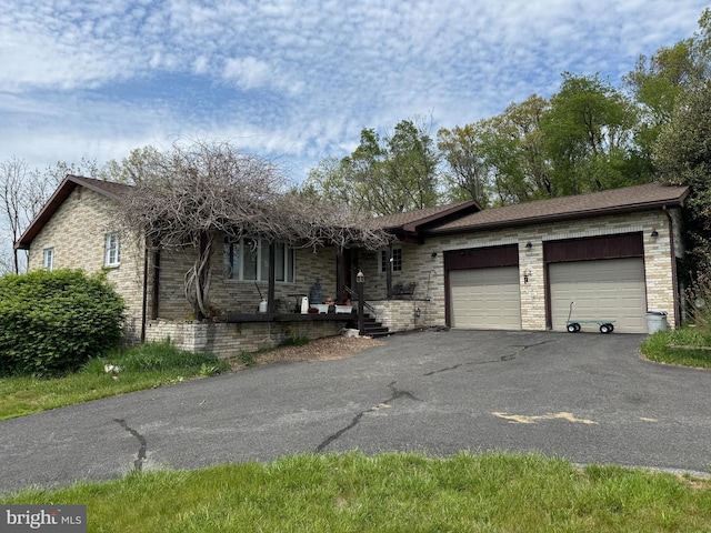 15004 Burnt Mill Rd, Shippensburg, PA 17257 - ranch-style home featuring driveway, an attached garage, a porch, and brick siding