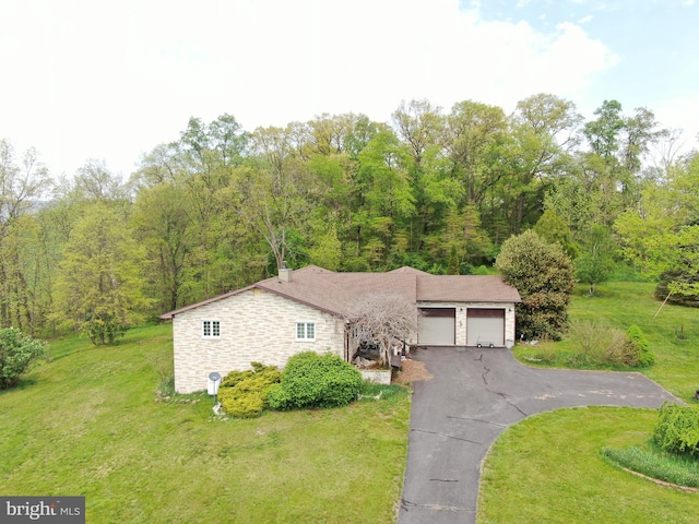 15004 Burnt Mill Rd, Shippensburg, PA 17257 - view of front of property with stone siding, an attached garage, a front yard, and driveway
