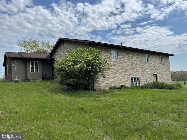 15004 Burnt Mill Rd, Shippensburg, PA 17257 - view of side of home featuring a lawn and brick siding