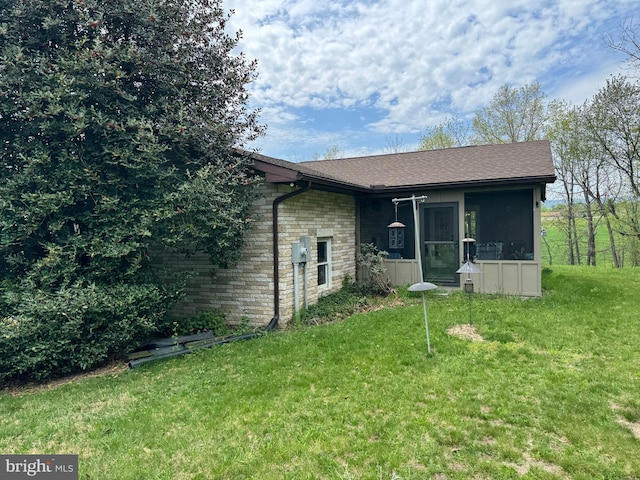 15004 Burnt Mill Rd, Shippensburg, PA 17257 - rear view of house featuring a sunroom, a lawn, and stone siding