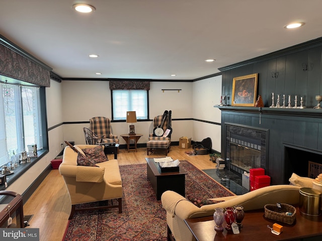 15004 Burnt Mill Rd, Shippensburg, PA 17257 - living room featuring ornamental molding, a fireplace with flush hearth, healthy amount of natural light, wood finished floors, and recessed lighting