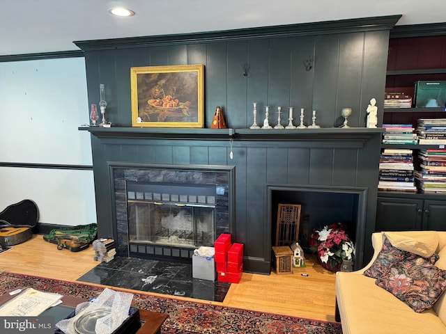 15004 Burnt Mill Rd, Shippensburg, PA 17257 - living area with a tile fireplace, wood finished floors, crown molding, and recessed lighting