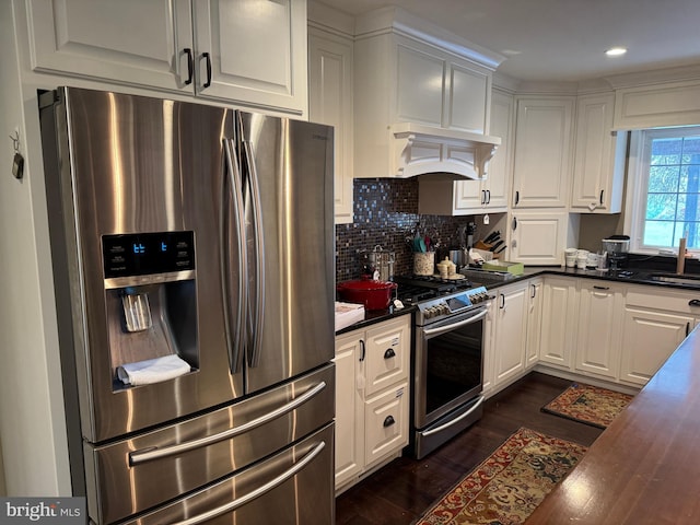 15004 Burnt Mill Rd, Shippensburg, PA 17257 - kitchen with appliances with stainless steel finishes, dark countertops, dark wood finished floors, white cabinetry, and recessed lighting