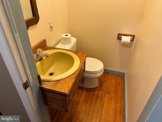 15004 Burnt Mill Rd, Shippensburg, PA 17257 - half bath with wood finished floors, toilet, and vanity
