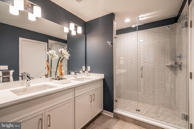 2001 Richmond St Unit 23B, Philadelphia, PA 19125 - bathroom featuring a sink, a stall shower, recessed lighting, and double vanity
