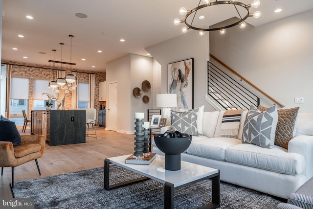 2001 Richmond St Unit 23B, Philadelphia, PA 19125 - living room featuring recessed lighting, baseboards, an inviting chandelier, and light wood-style floors