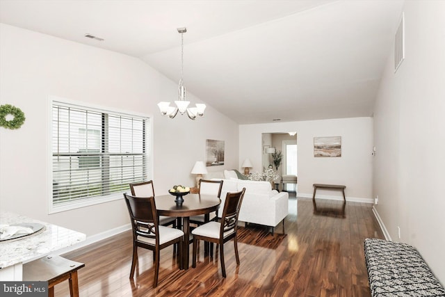 9 Fernwood Ct, Columbus, NJ 08022 - dining area featuring a chandelier, dark wood-style floors, baseboards, and vaulted ceiling