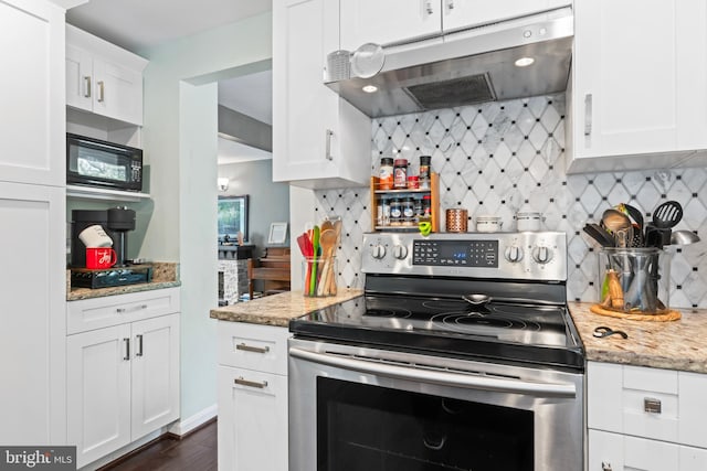 202 Trail Ct, Sterling, VA 20164 - kitchen with stainless steel range with electric stovetop, under cabinet range hood, black microwave, decorative backsplash, and white cabinetry