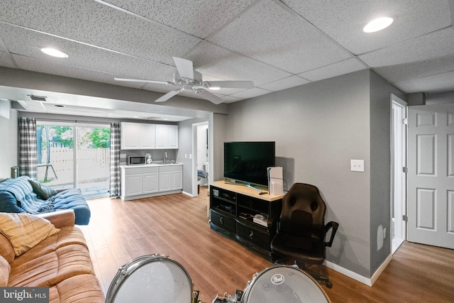 202 Trail Ct, Sterling, VA 20164 - living area featuring light wood finished floors, baseboards, and a ceiling fan