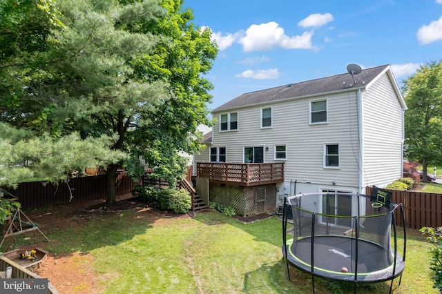 202 Trail Ct, Sterling, VA 20164 - rear view of house with a deck, a trampoline, and stairway