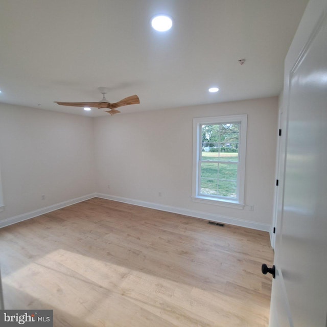 101 Thompson St, Hurlock, MD 21643 - empty room with baseboards, light wood-type flooring, a ceiling fan, and recessed lighting