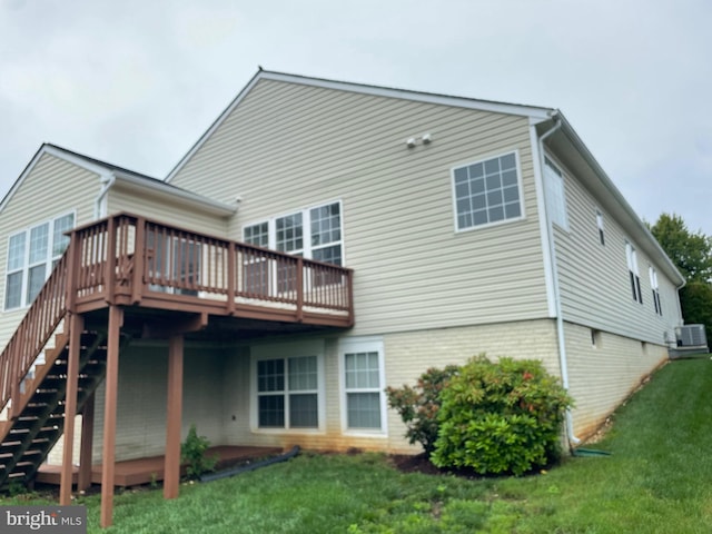 3754 China Grove Mews, Dumfries, VA 22025 - rear view of house featuring a wooden deck, a lawn, and stairway