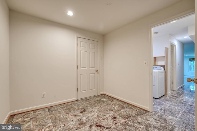 unfurnished room featuring washer / clothes dryer, baseboards, and recessed lighting