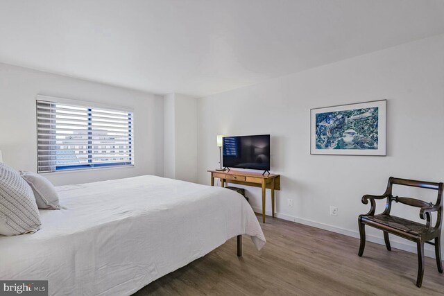 900 N Stafford St Unit 2330, Arlington, VA 22203 - bedroom featuring wood finished floors and baseboards