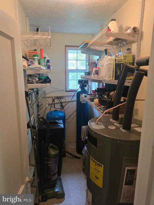 storage room featuring electric water heater