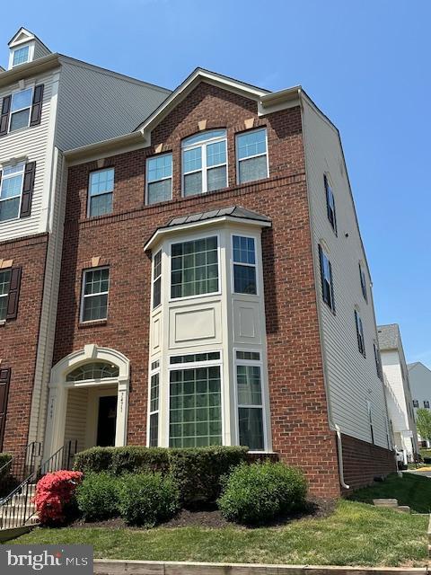 7471 Brunson Cir Unit 10A, Gainesville, VA 20155 - view of front of home with brick siding