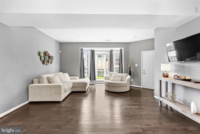 7471 Brunson Cir Unit 10A, Gainesville, VA 20155 - living room with dark wood-style floors and baseboards