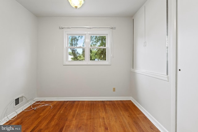 100 Furnlea Dr, Glen Burnie, MD 21060 - empty room featuring wood finished floors and baseboards