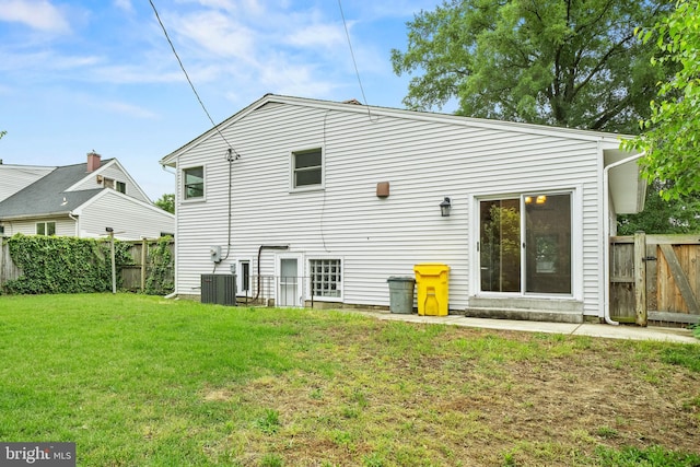 100 Furnlea Dr, Glen Burnie, MD 21060 - back of house featuring central AC