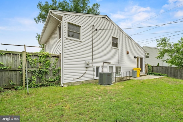 100 Furnlea Dr, Glen Burnie, MD 21060 - back of property featuring central AC