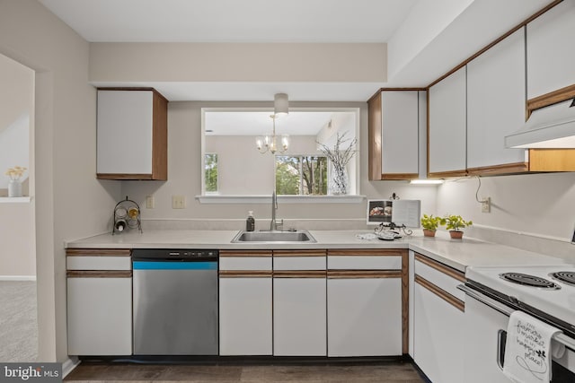 135 Woodlake Dr, Marlton, NJ 08053 - kitchen featuring dishwasher, a sink, a chandelier, and light countertops