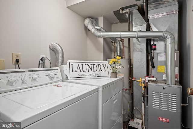 135 Woodlake Dr, Marlton, NJ 08053 - laundry area with separate washer and dryer, heating unit, and water heater