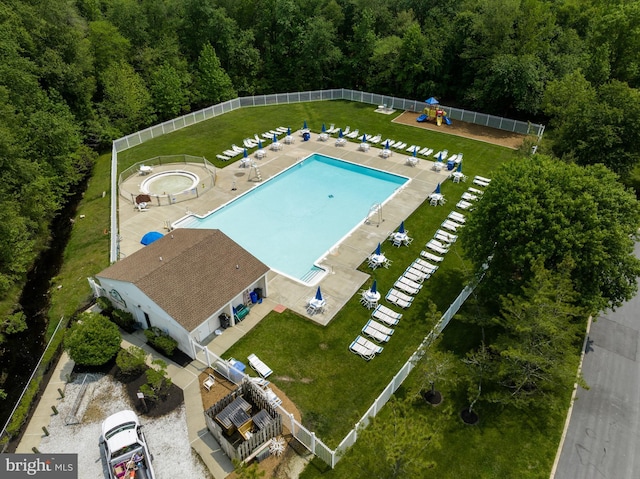 135 Woodlake Dr, Marlton, NJ 08053 - drone / aerial view of a pool area and a forest
