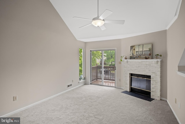 135 Woodlake Dr, Marlton, NJ 08053 - unfurnished living room with a brick fireplace, carpet floors, ceiling fan, baseboards, and lofted ceiling