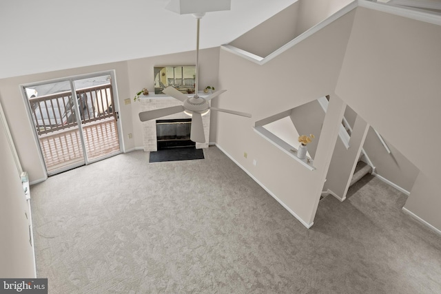 135 Woodlake Dr, Marlton, NJ 08053 - unfurnished living room featuring carpet, a fireplace with flush hearth, baseboards, and high vaulted ceiling