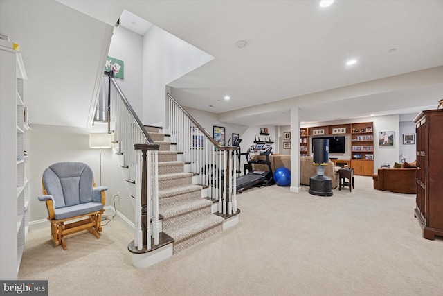 interior space featuring carpet floors, recessed lighting, and baseboards