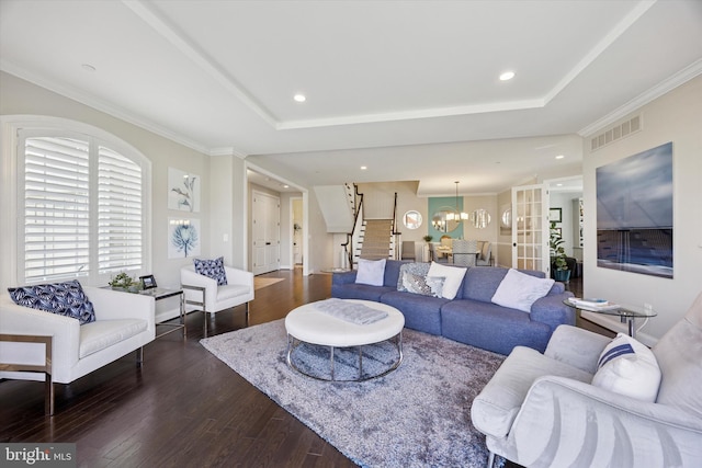 living room with recessed lighting, stairs, dark wood-style floors, and visible vents