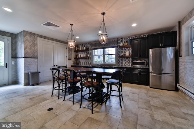 dining room with visible vents, recessed lighting, and bar