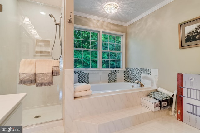 bathroom featuring a garden tub, a textured ceiling, crown molding, and a shower stall