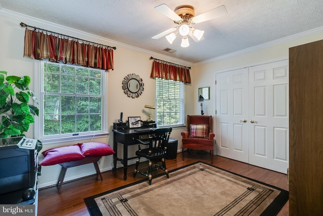 office featuring crown molding, a ceiling fan, a textured ceiling, and wood finished floors