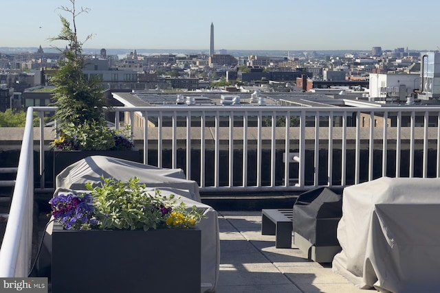 balcony featuring a view of city