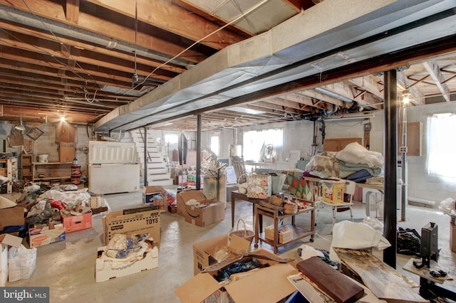 below grade area with fridge