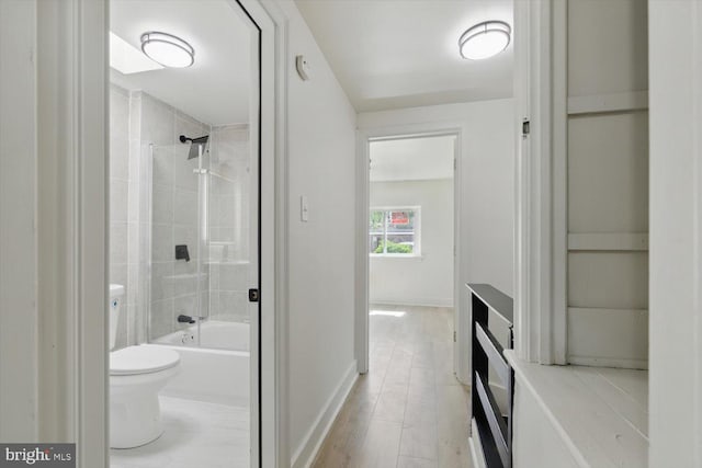 408 Fairview Ave, Lancaster, PA 17603 - full bath featuring wood finished floors, baseboards, tub / shower combination, and toilet