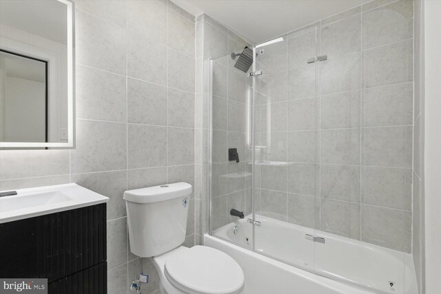 408 Fairview Ave, Lancaster, PA 17603 - full bathroom with vanity, shower / bathing tub combination, toilet, and tile walls